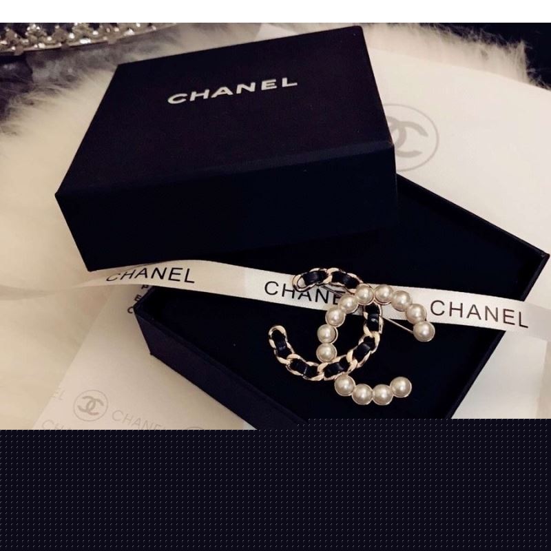 Ch*el brooches